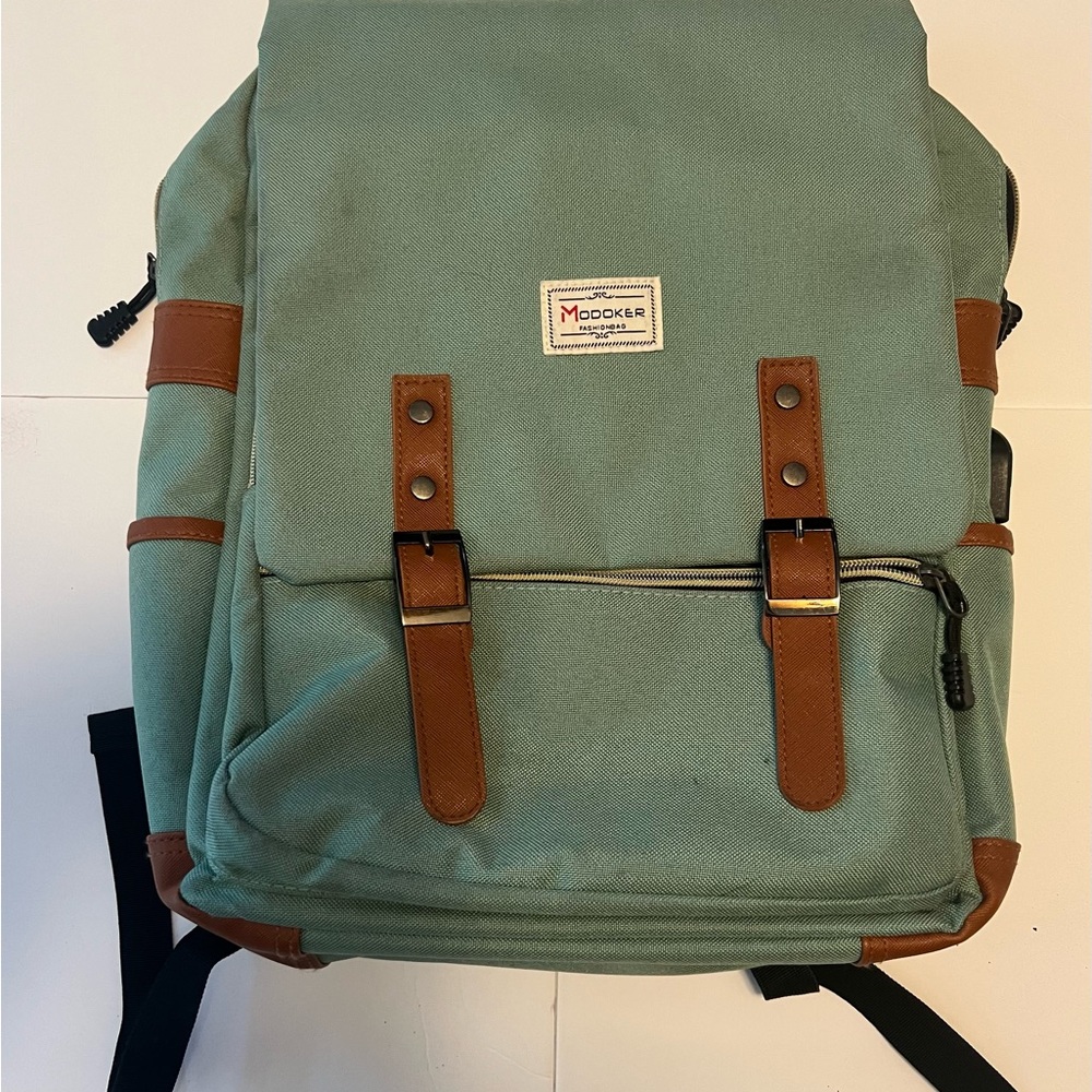 Green and Brown Canvas Backpack with Leather Accents